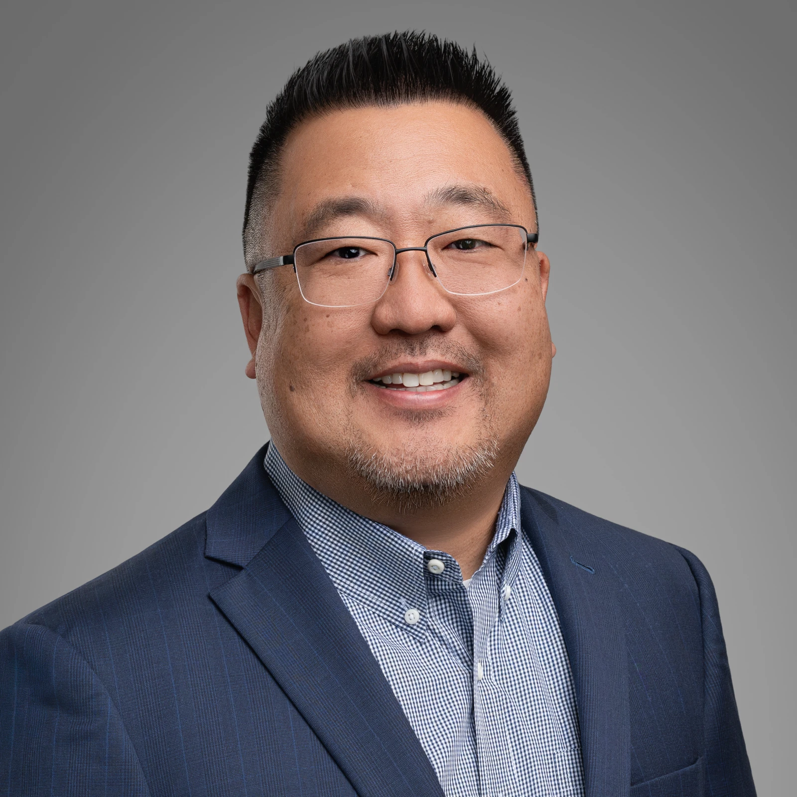 Headshot photo of Stanford Hirata