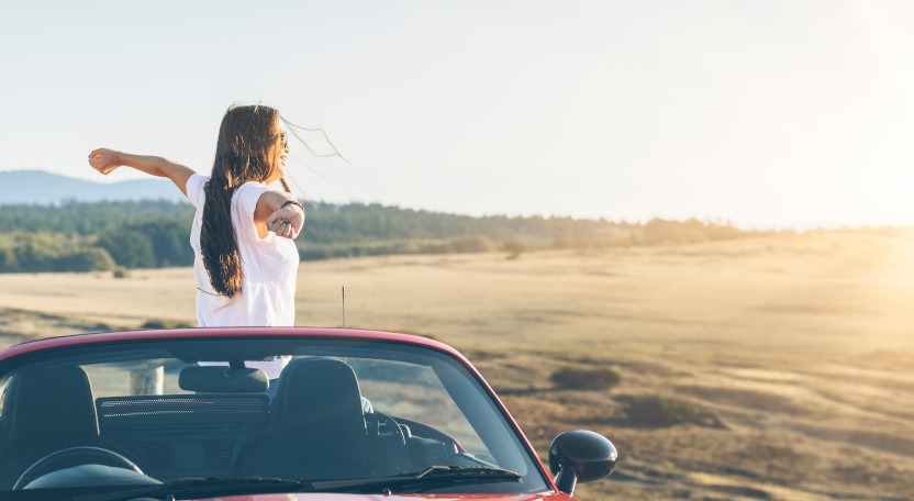 Photo of a car at sunset.